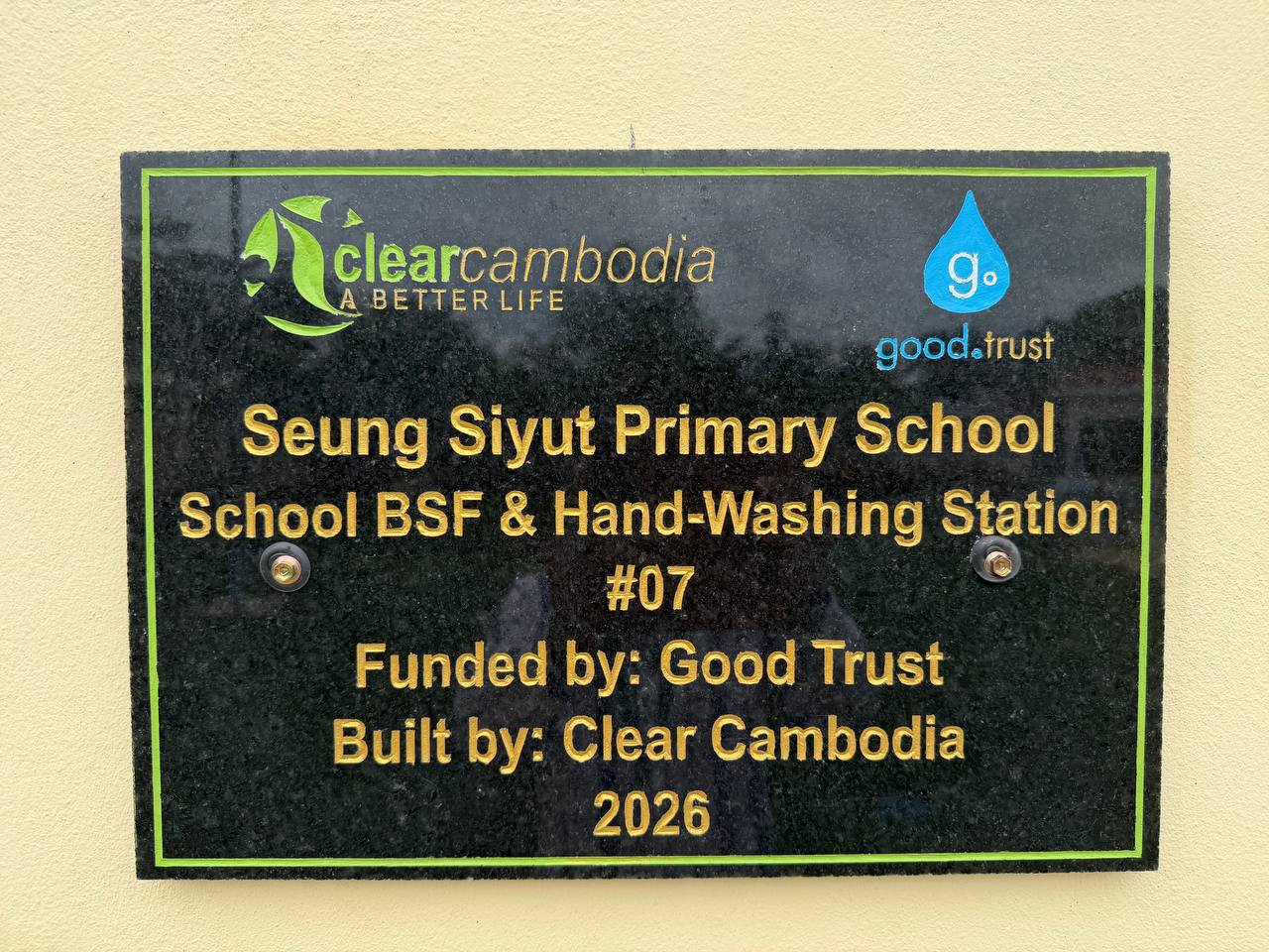 Plaque at Seung Siyut Primary School: School BSF and Hand-Washing Station #07, funded by Good Trust, built by Clear Cambodia, 2026